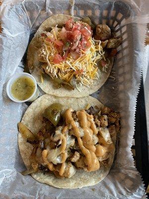 Watson Taco with chicken and the Demon Taco with chicken jalapeno garlic sauce on the side