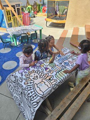 Coloring activity children having fun.