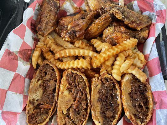 Steak eggrolls with fries and 10 count Da Flavor Wings