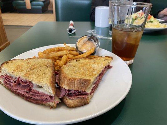 Reuben with french fries and no sauerkraut. Drink is unsweet tea.