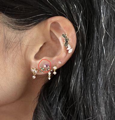 Staggered ear piercing, diamond stud