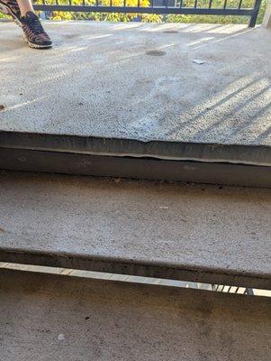 The steel plate that doesn't attach to the stairs that trips EVERYONE