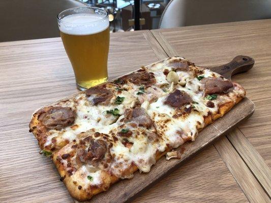 Prosciutto flatbread with a cold Sweetwater IPA to wash it down.