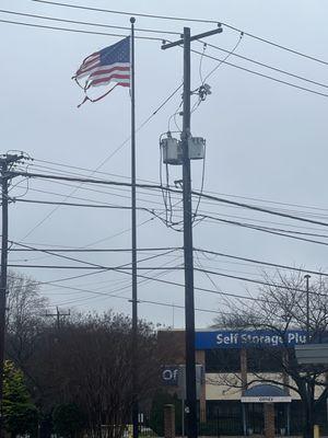 The American flag flying at Self Storage Plus.