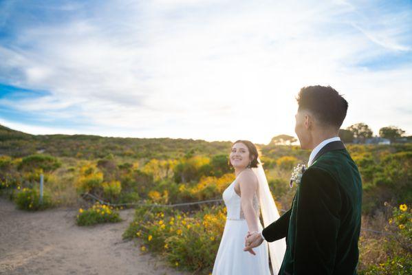 Bride and groom on their wedding day holding hands