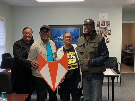 Participants posing after taking our Intermediate Handgun Class!