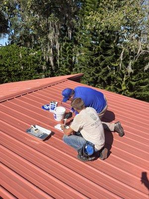 Henry Silicone Coating Certified Installer class. Dustin is being certified by Eric from Henry company.