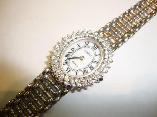 14 Karat White Gold Watch with Diamond Bezel.