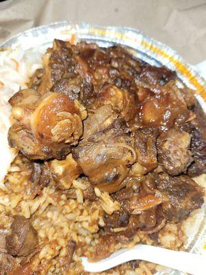 Oxtail n white rice with cole slaw.