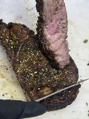 Tomahawk Steak glistened in edible golden bites