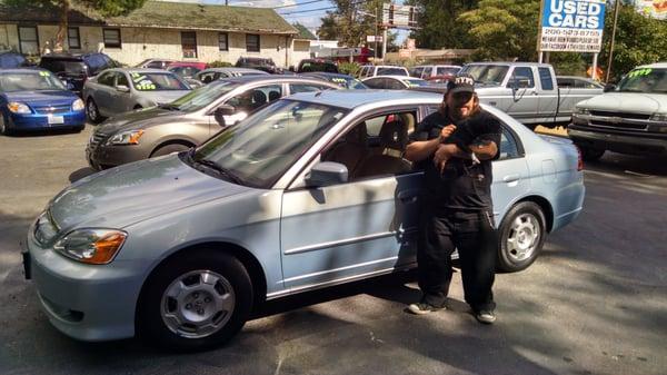 Aaron and his dog got a new Honda Hybrid. Now he can go back and forth to Spokane every week on a tank of gas.