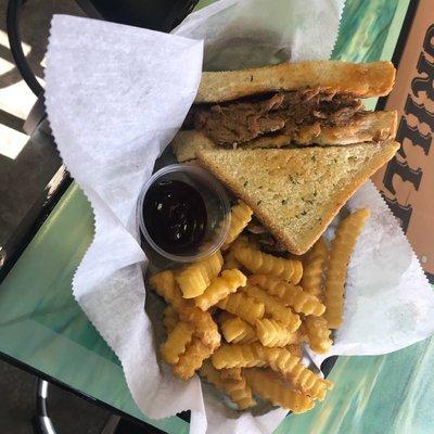 Pulled pork sandwich and with crinkle fries