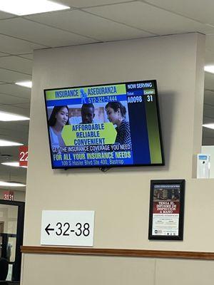 Flatscreens in waiting area show next appts being served.