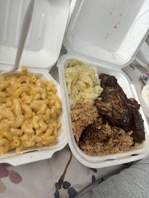 Jerk chicken, rice & peas, cabbage, and mac & cheese.