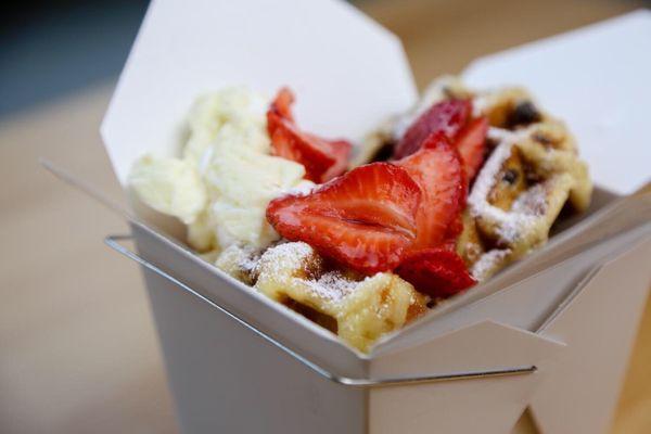 Brioche Waffles in a Box! With honey soaked strawberries marscarpone marshmallow fluff.