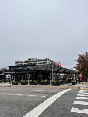 Outside. Lots of outdoor covered seating with heaters