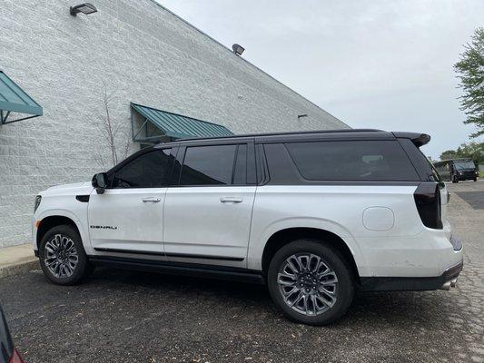 GMC Denali came in for window tint & gloss black wrap for the top