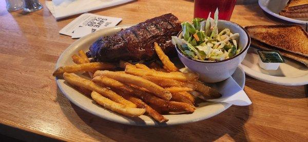 Half rack rib plate with fries, slaw, & toast.