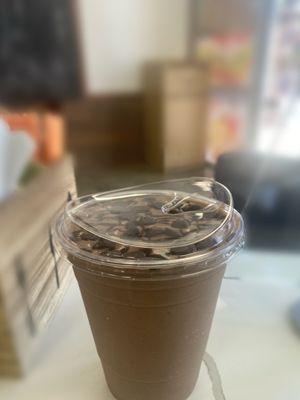 Cacao ceremony smoothie with added chocolate and mocha topping