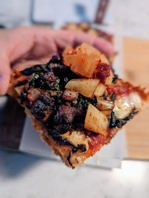 Seoul Pizza. Kimchi tomato sauce, pork belly, shiitake, pear, bacon.  Just ok