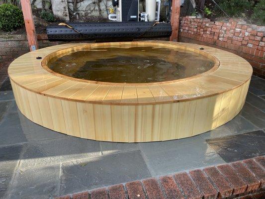 Alaskan Yellow Cedar, partially in ground, with full rim deck and cladding