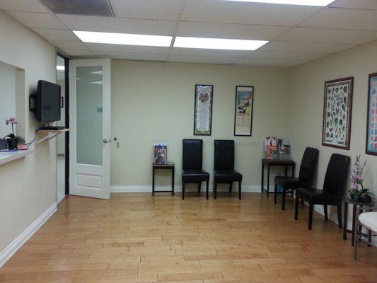 Clean and simple waiting room.   Peaceful and serene.