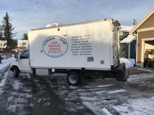 Big truck swallows up the junk