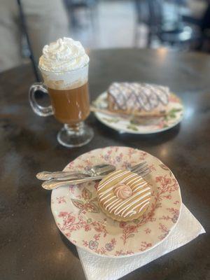 Really good rose latte with alternate milk and the baked stuff was ok.