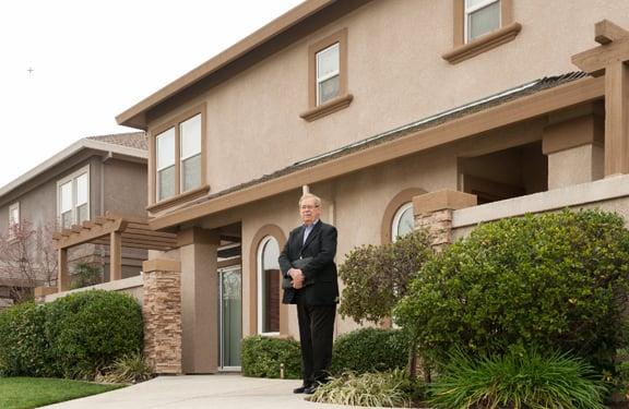 Standing in front of 2 four plexes I sold in Yuba City in 2014