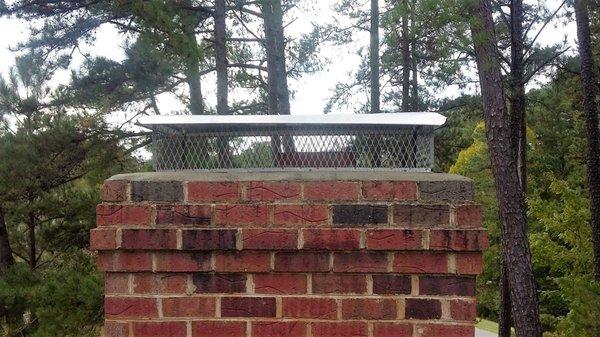 Chimney cap installation.