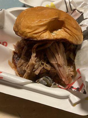 Pulled Pork Sammich; barely sauced and oily with buns that's couldn't hold the meat