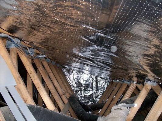 Radiant Barrier on the rafters and Blown in Cellulose Insulation in the attic.