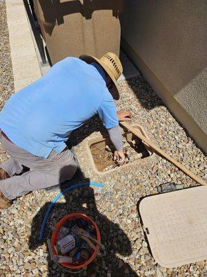 Johnny making quick work of our valve box leak.