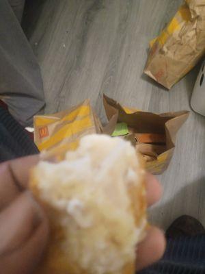 Ordered chicken nuggets took a bite tasted funny , so broke it open it has a dough like substance in side of it.