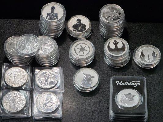 Star Wars and novelty silver coins.