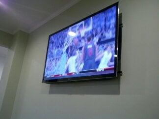 TV wall mounted in basement