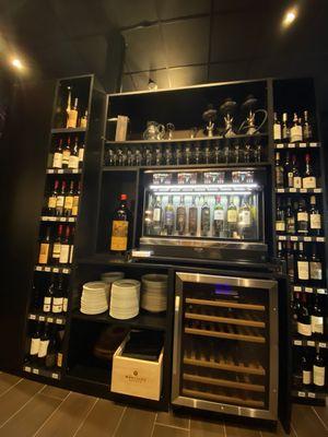 Wine machine with different wines to choose from (there are also other wine stations with rose and white wines)