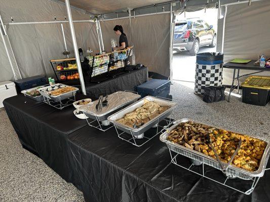 Trays of chicken & Gyro with rice and vegetables.