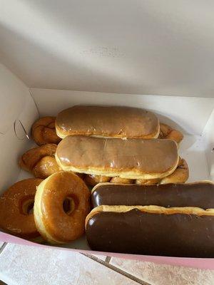 Maple bar, chocolate bar, twisted cinnamon and glazed donuts