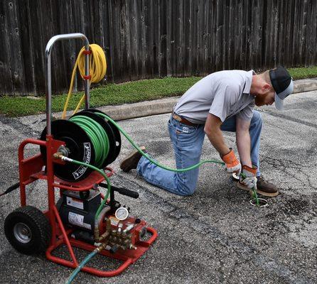 Hydro jetter drain cleaning uses high-pressure water to safely remove clogs