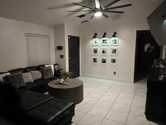 Tile and baseboard installation done on this complete interior remodel. Painted walls and doors!