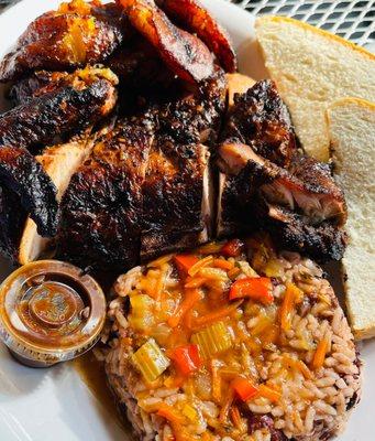 Jerk chix combo with red beans & rice & fried plantains.