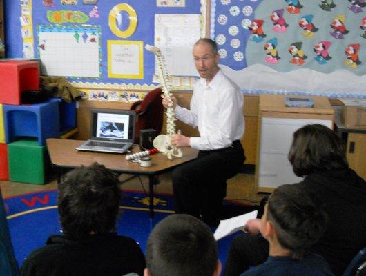 Teaching students at Washington Elementary about what it is like to be a chiropractor.