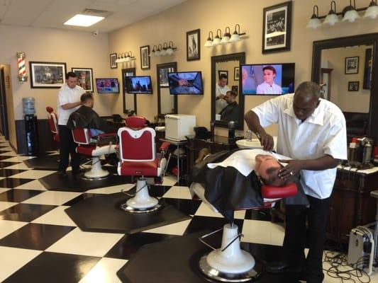 Traditional barbers at work.