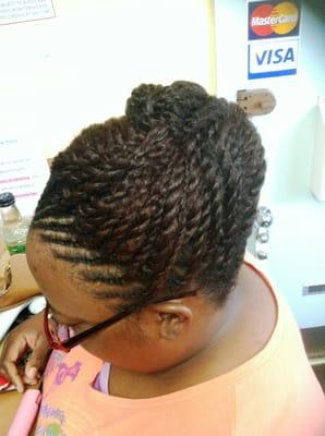 A two strand/flat twist updo by stylist Cyndy