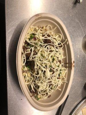 My bowl, brown rice, black beans, Barbacoa, cheese, and corn salsa