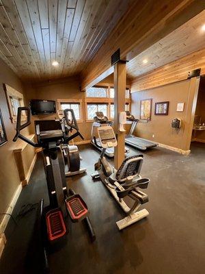 Cardio equipment in fitness center - opens at 8am