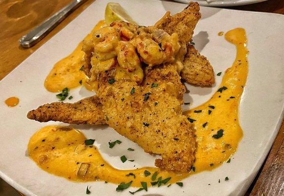 Fresh (and I mean FRESH) fried catfish with a crawfish sauce. Heavenly! Comes with roasted fingerling taters and a salad of your choice.