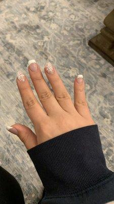 Nail extensions, glittery snowflakes design