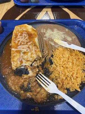 Beef burrito with beans and rice.